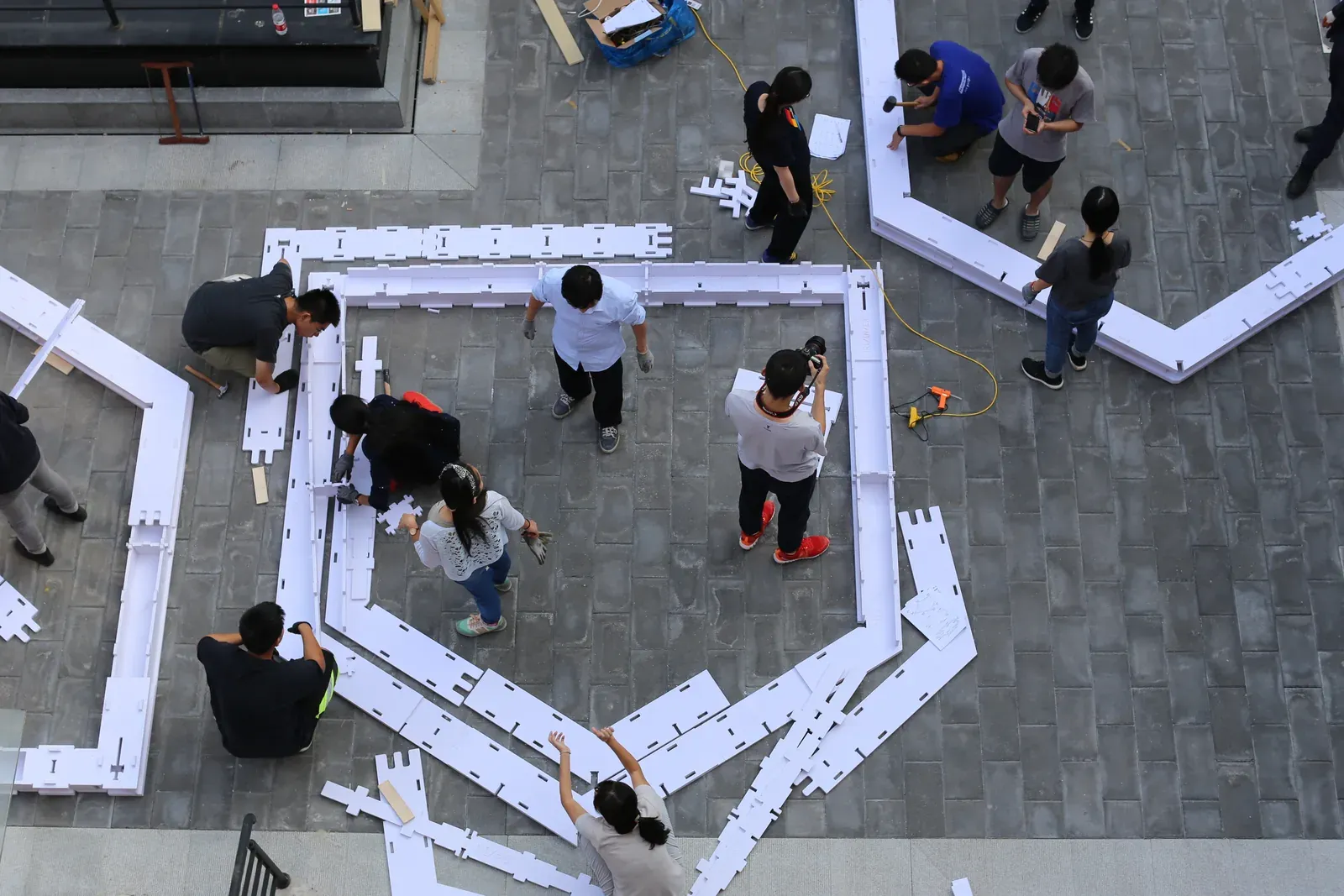 Volunteers assembling the chassis
