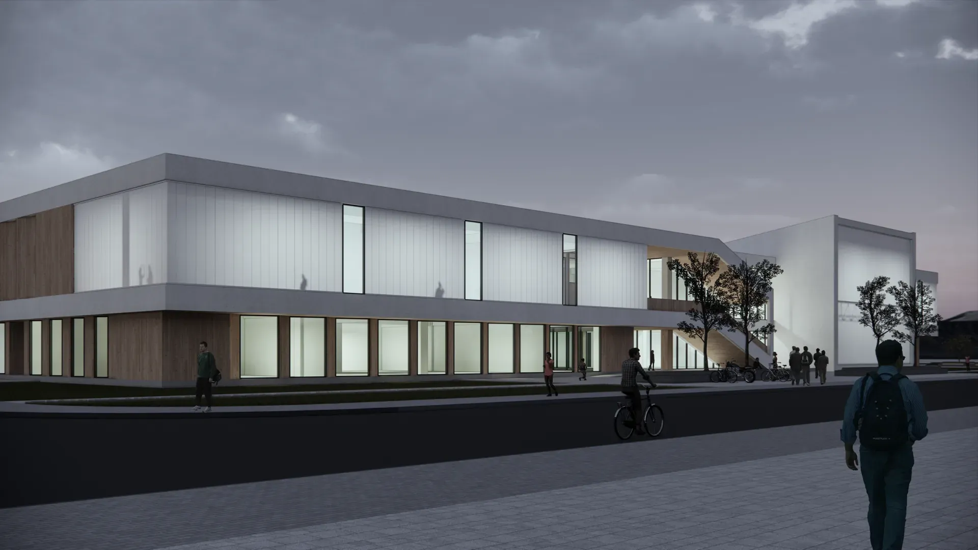 Rendering of the student activity centre at dusk, with people walking towards the entrance